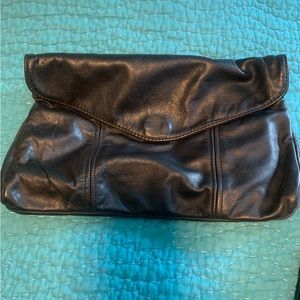 Generic Black Plerther clutch. 11 1/2 x 7 1/2 x 1.